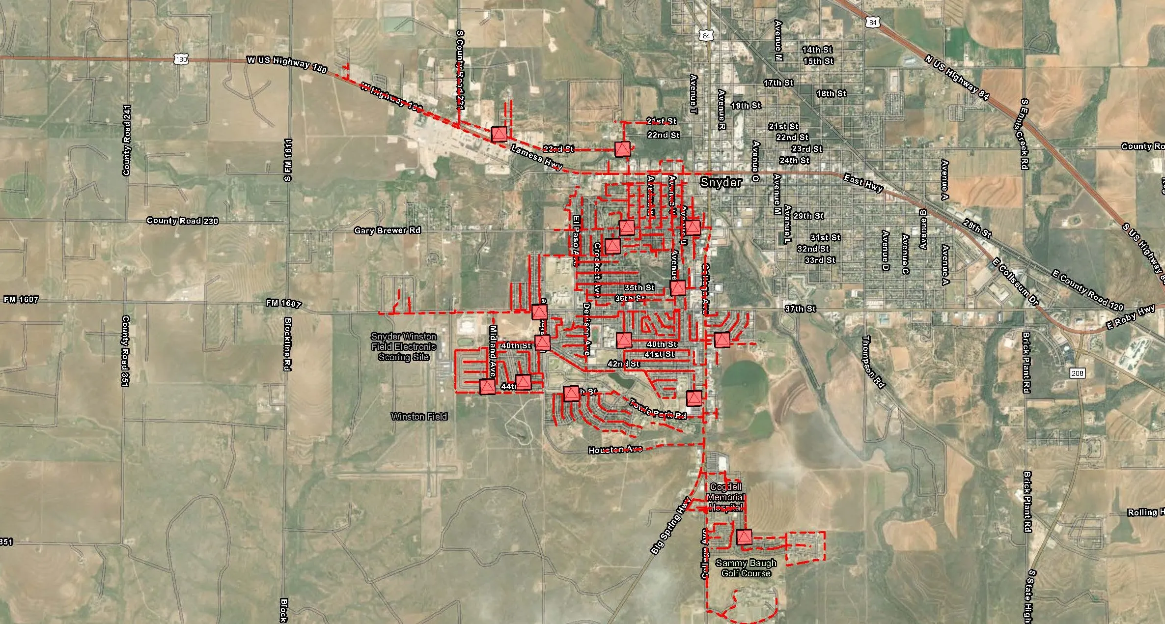 FTTH network design for Snyder, Texas — red distribution routes overlaid on aerial imagery.